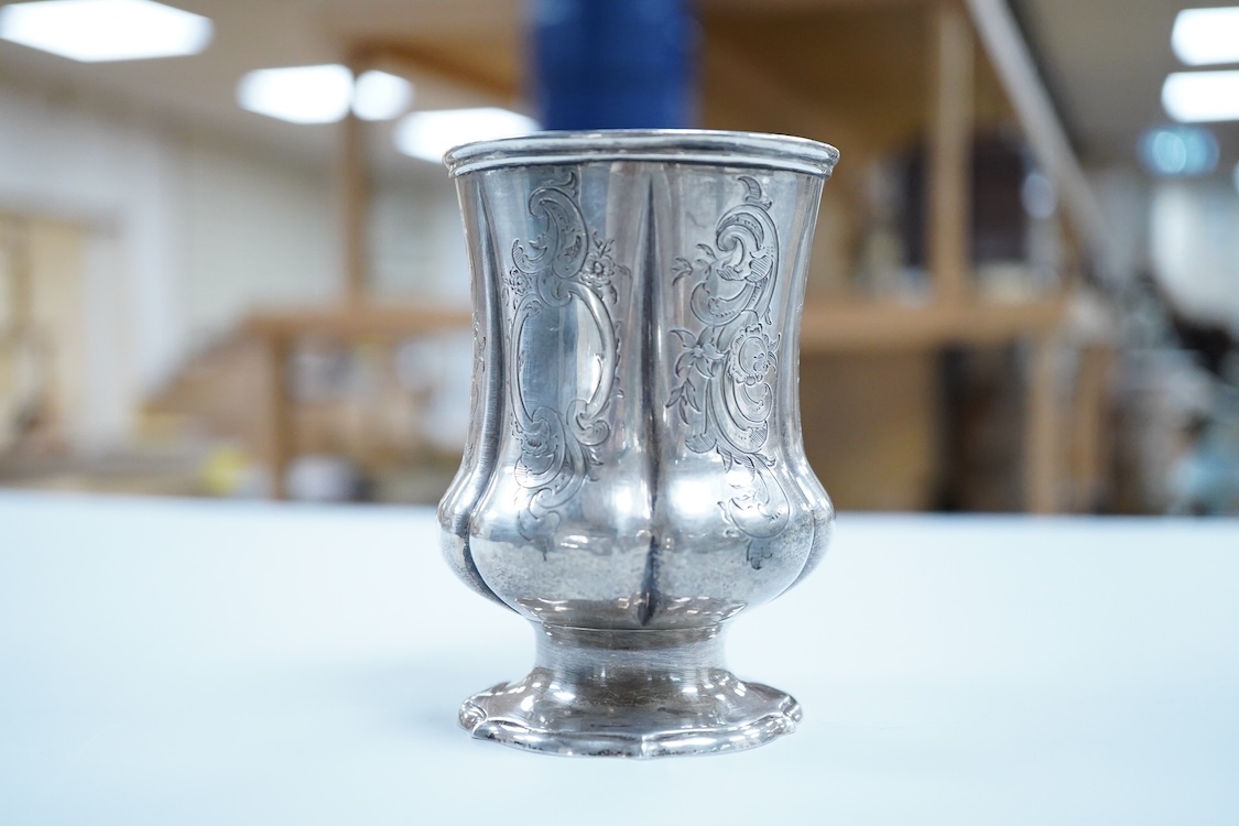 A Victorian engraved silver christening mug, on a pedestal foot, by Daniel & Charles Houle, London, 1848, 97mm, 4.4oz.